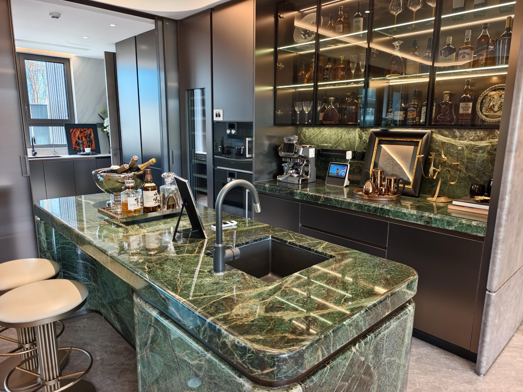 Luxury kitchen with green marble countertop