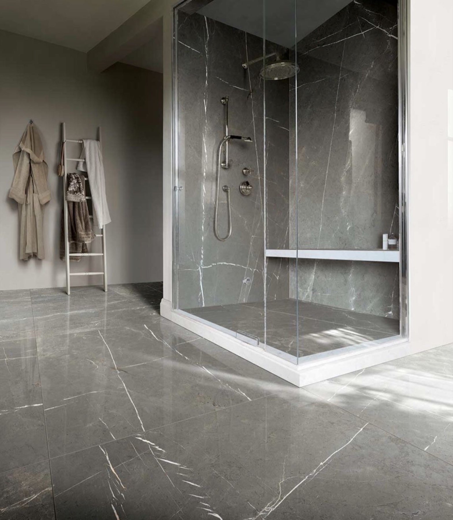 Bathroom with grey marble shower walls and flooring